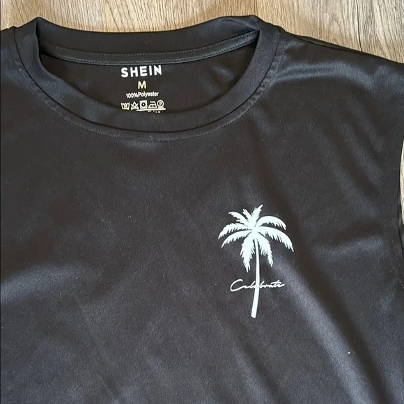 Black Sleeveless Top with Palm Tree Design - Picture 4 of 5